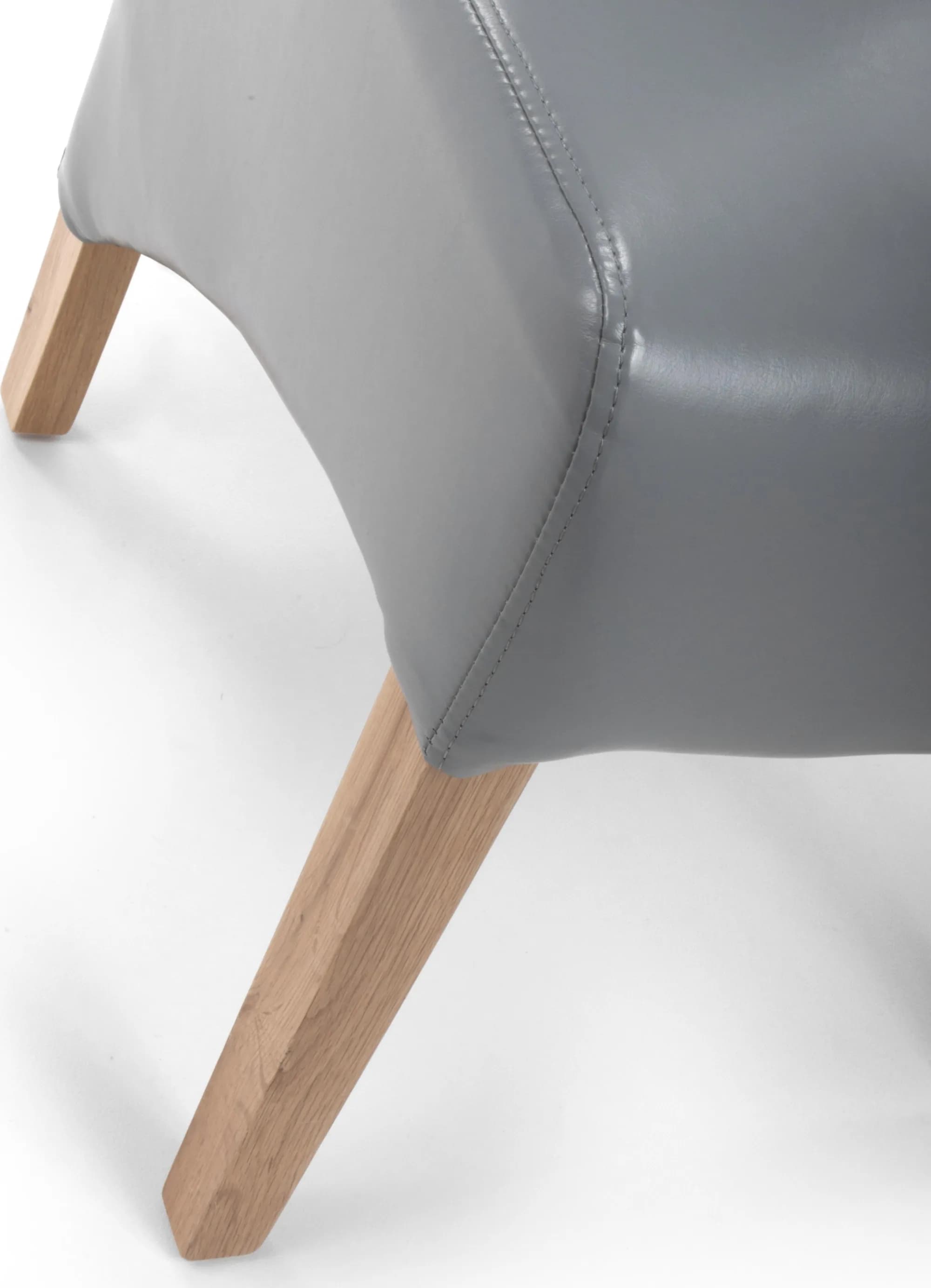 Krista Roll Back Bonded Leather Grey Dining Chair