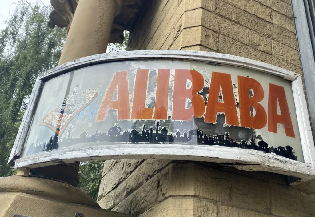 The original Ali Baba Furniture storefront sign in Bradford